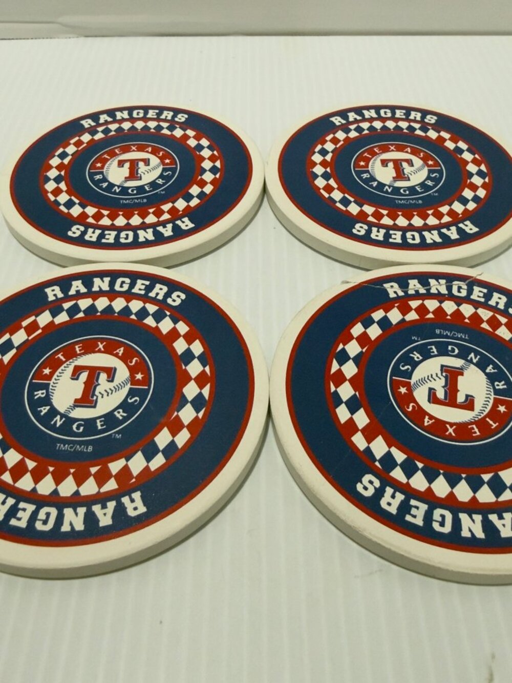 Texas Rangers Ceramic Set of 4 Coasters. One is cracked.